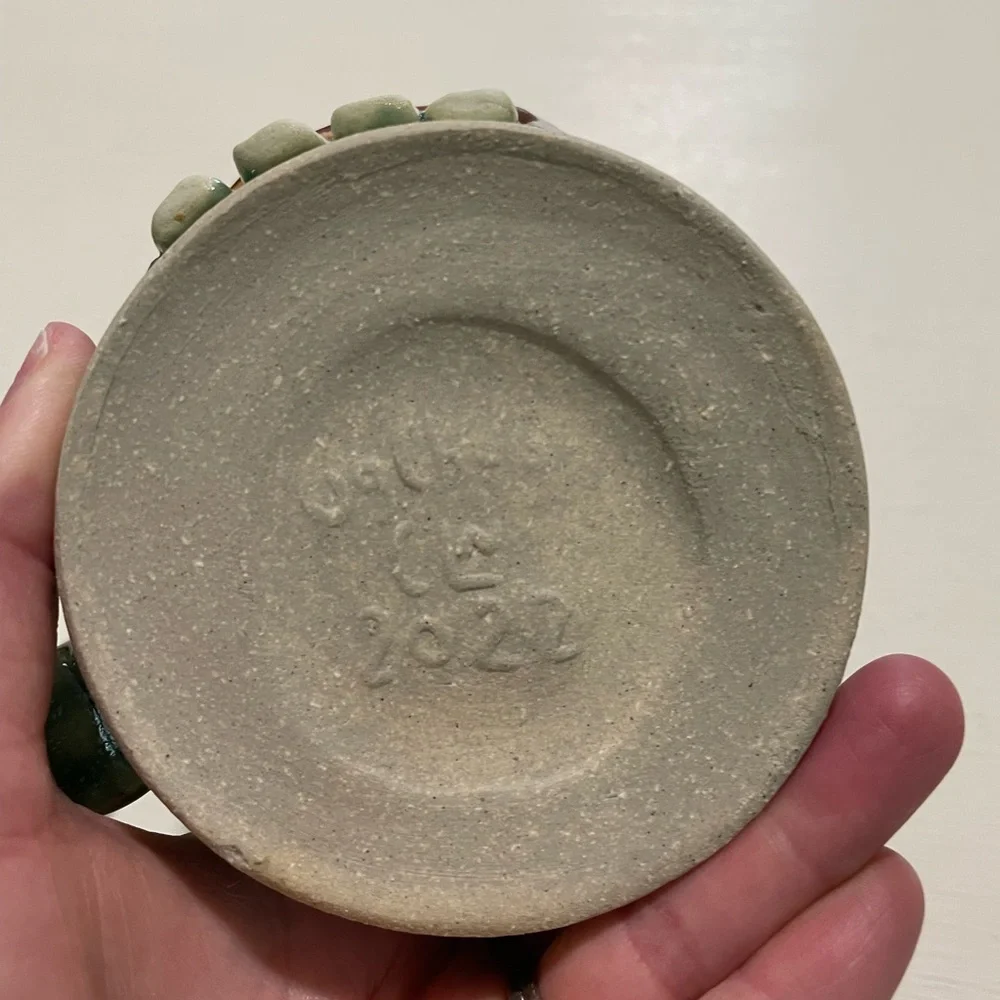 Good earth garden center‎ mug with crazy face